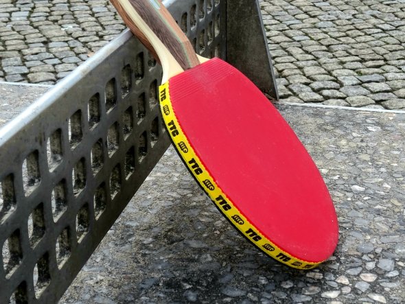 Table tennis bat on the table