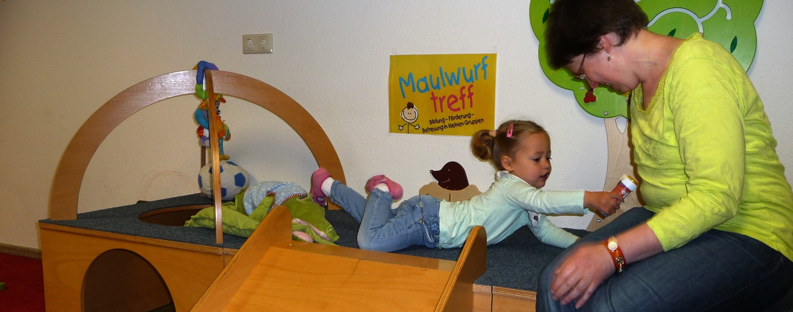 Childminder with girl