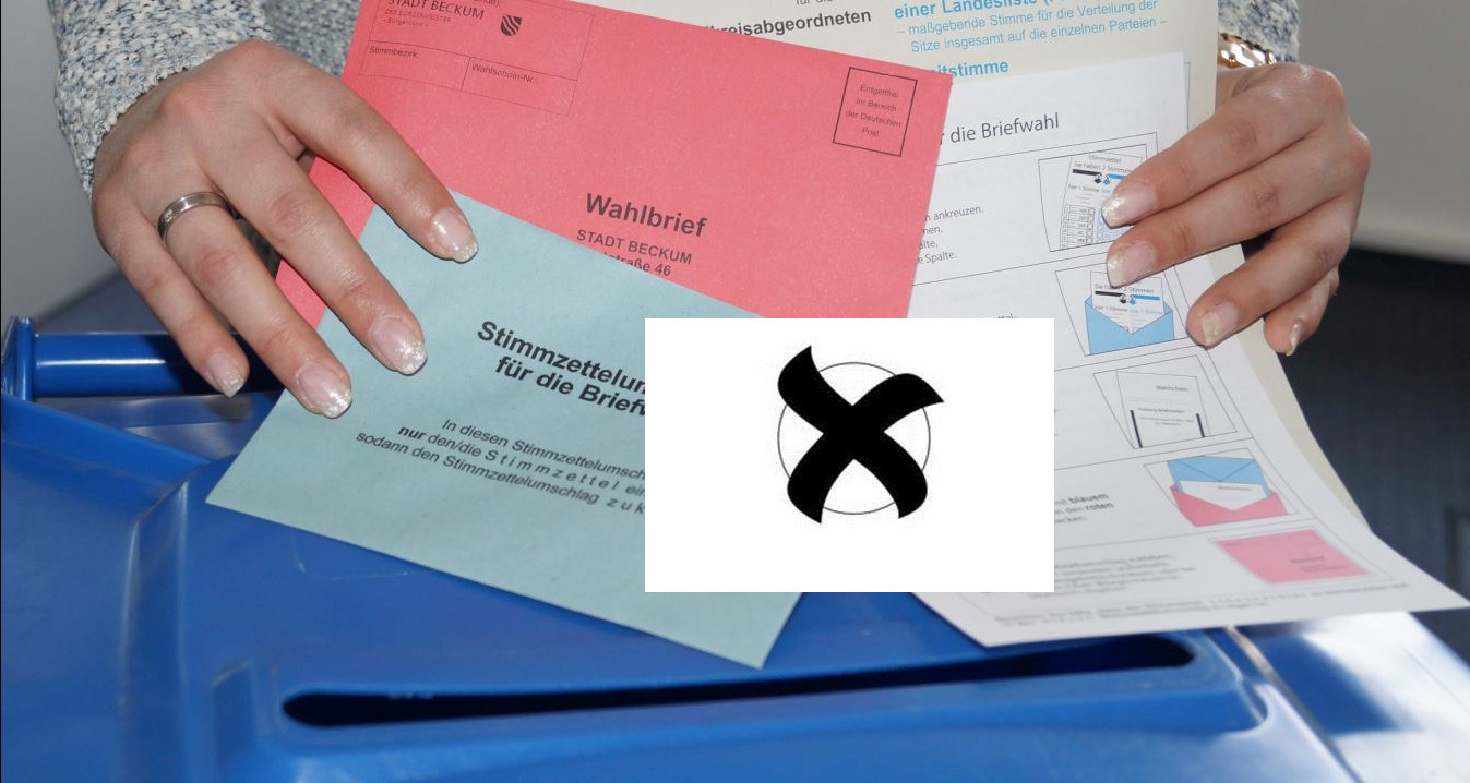 Voting cross at the ballot box