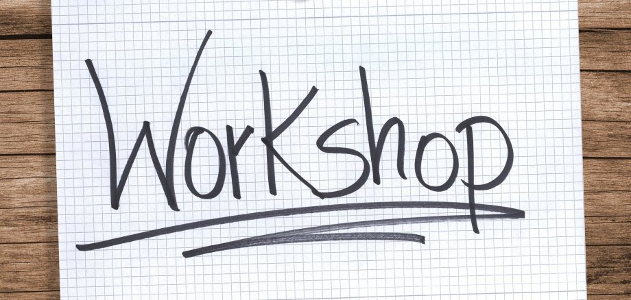Angepinnter Zettel mit der Aufschrift Workshop